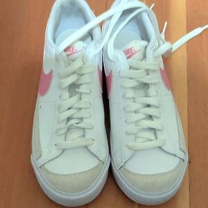 Nike Kids White Sneakers with Pink Swoosh and Cream Toe